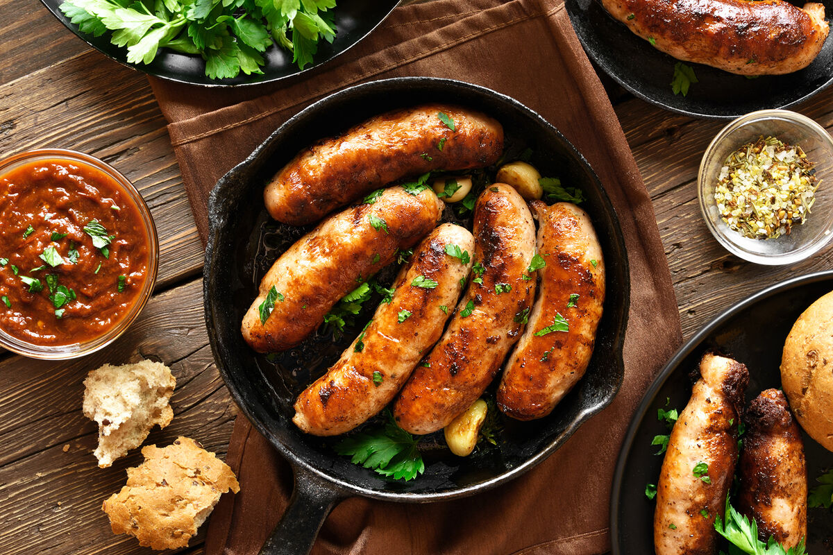 Roasted sausages in frying pan