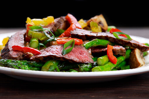 Grilled steak with stir-fried vegetables