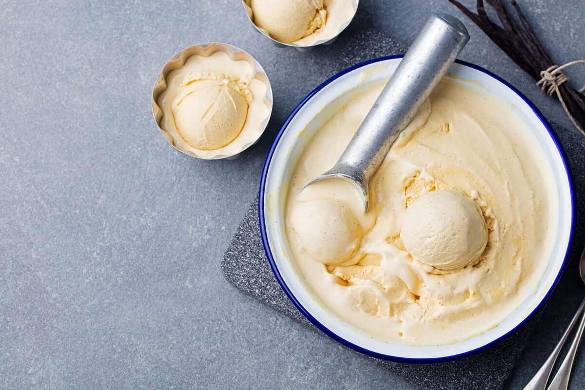 Homemade vanilla, caramel ice cream in vintage bowl