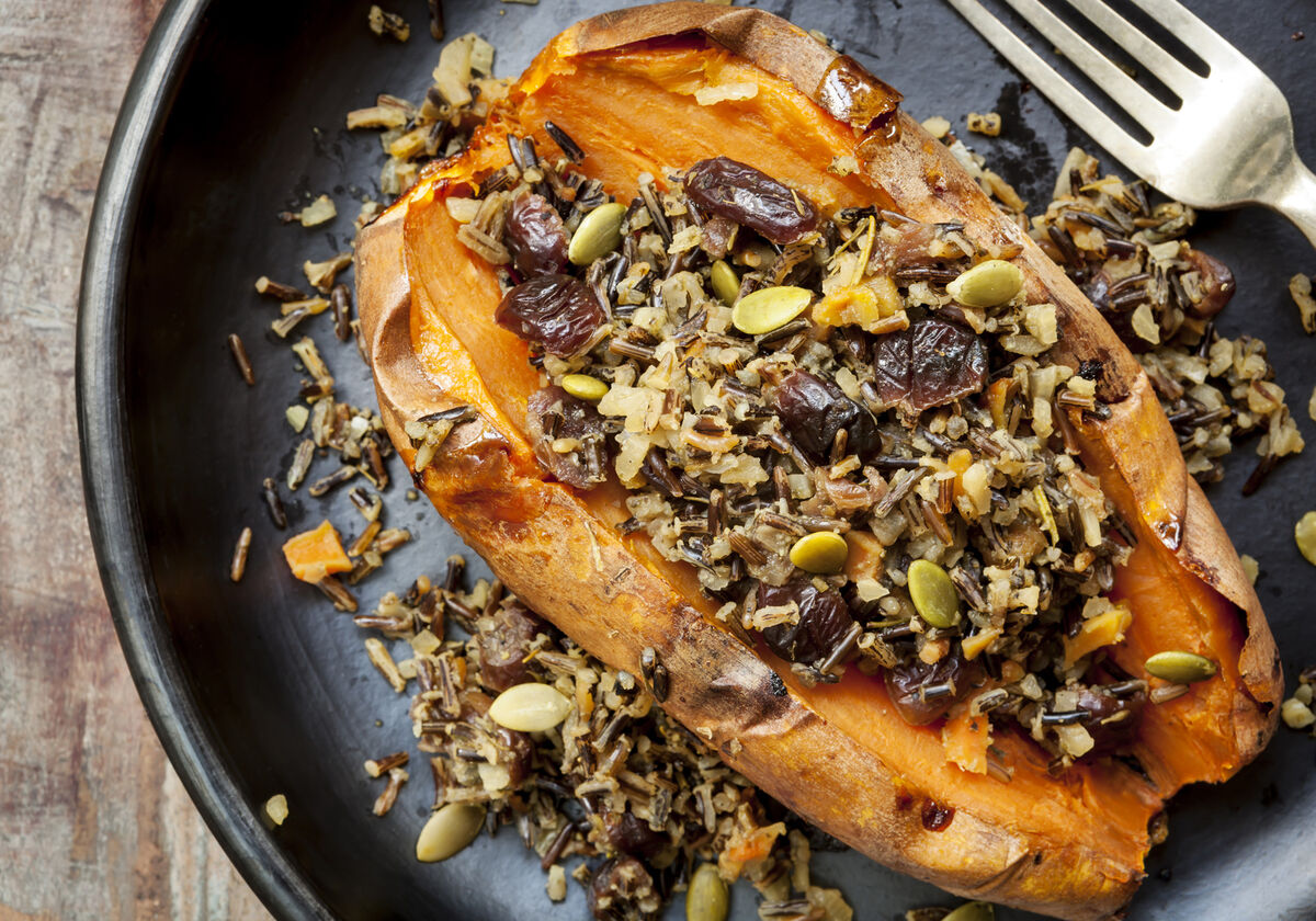 Baked Sweet Potato Stuffed With Wild Rice Seeds and Cranberries