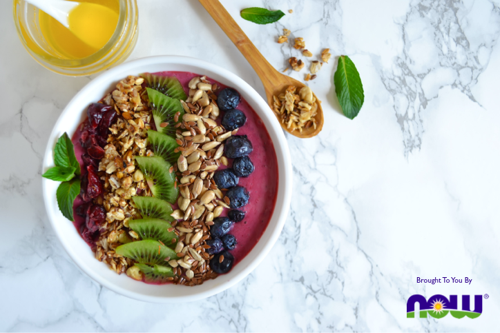 berry smoothie bowl with kiwi and walnuts