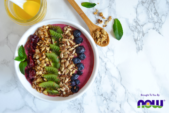 berry smoothie bowl with kiwi and walnuts