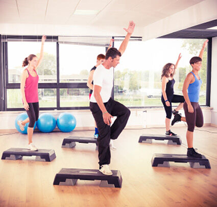 Step aerobics class