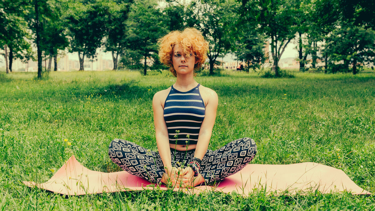Woman performing a hip stretch