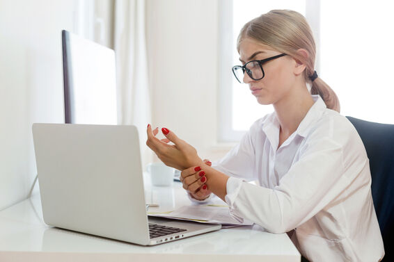 Young woman wrist pain