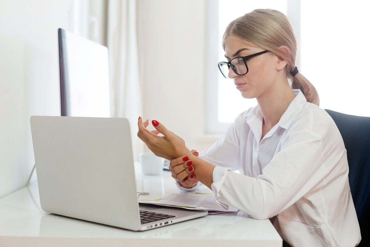 Young woman wrist pain