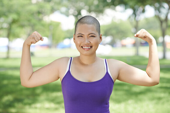 fit happy woman flexing