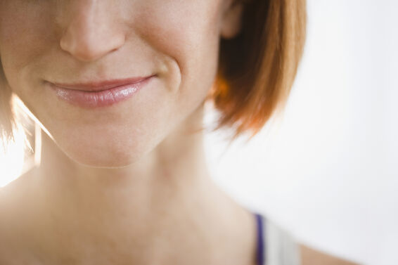 woman doing chin exercise