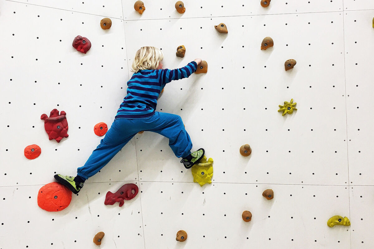 Boy Climbing Wall