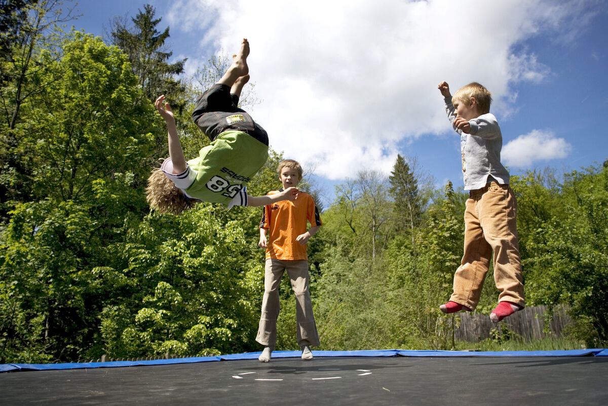 Children playing on a trampoline