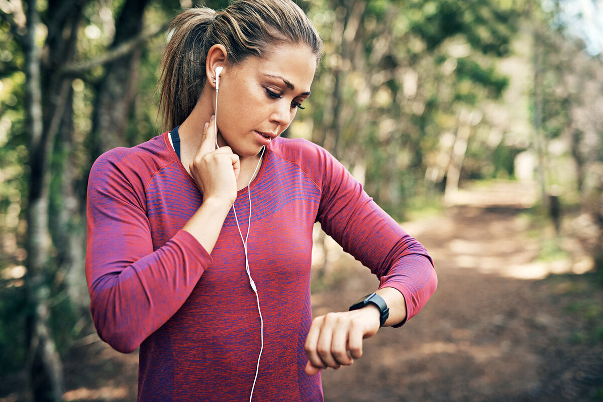 woman checking her heart rate