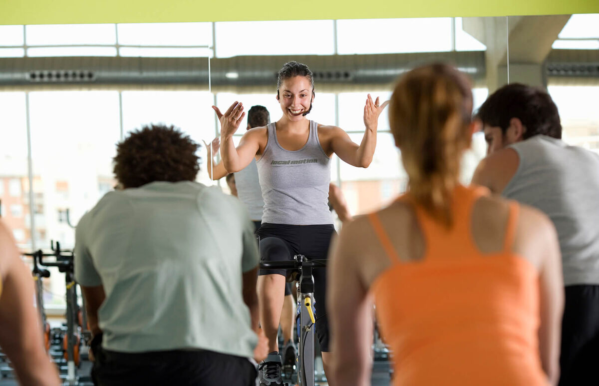 Fitness instructor leading class