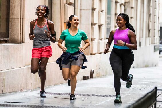 three women running