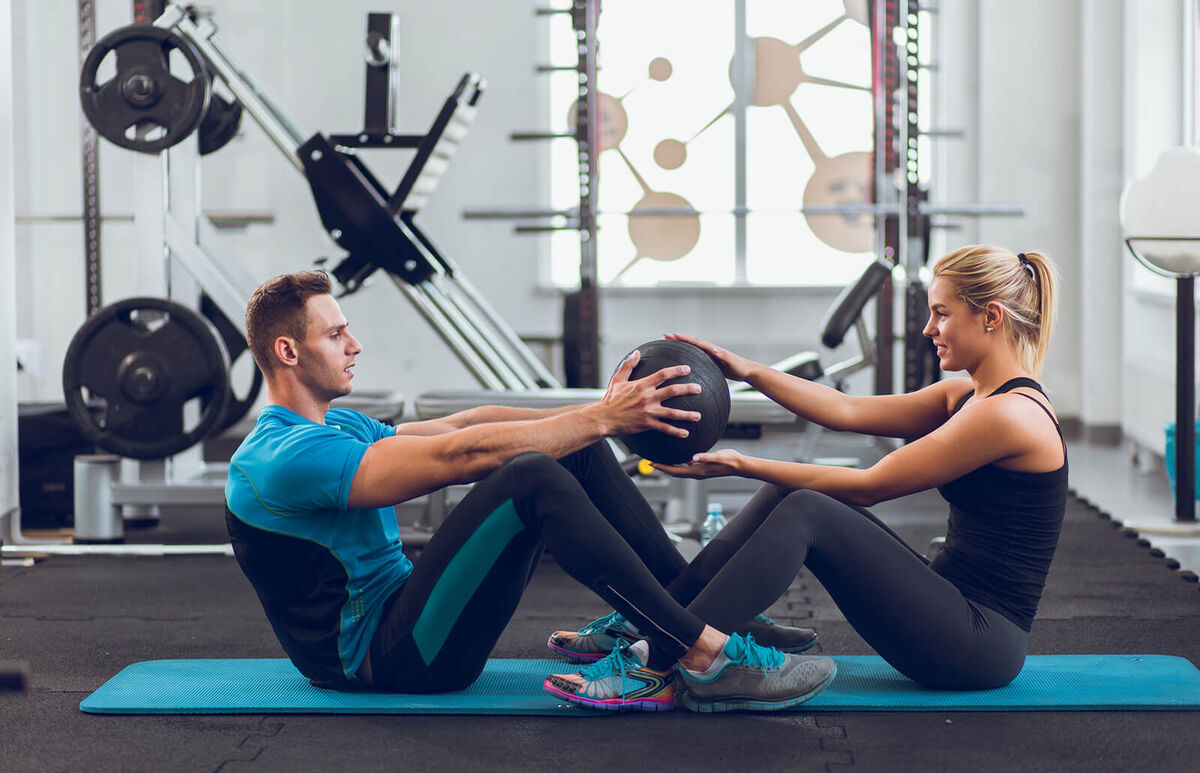 partner sit up ball toss