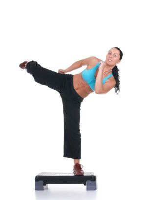 Woman kick boxing