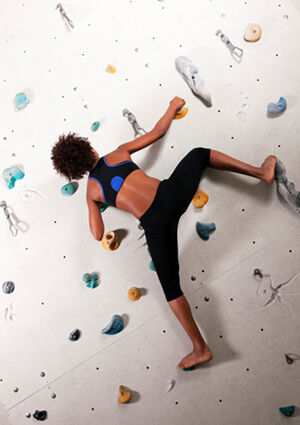 Woman on climbing wall
