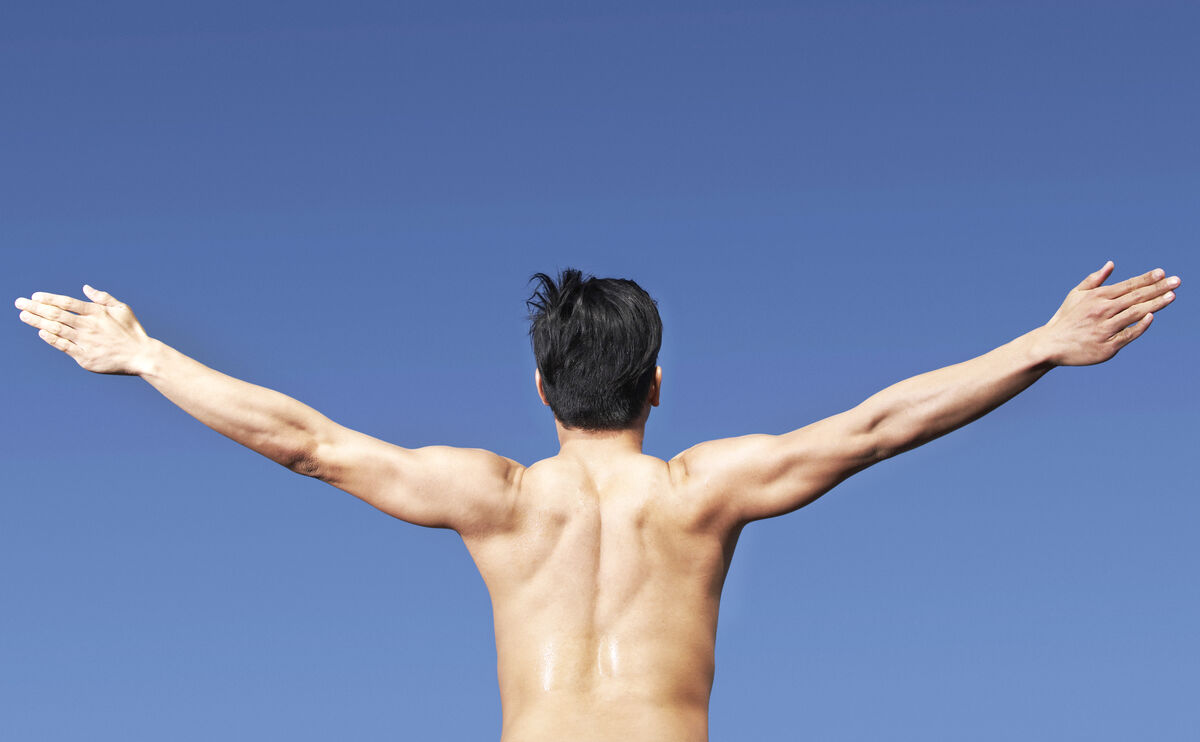 Bare chested Man Exercising