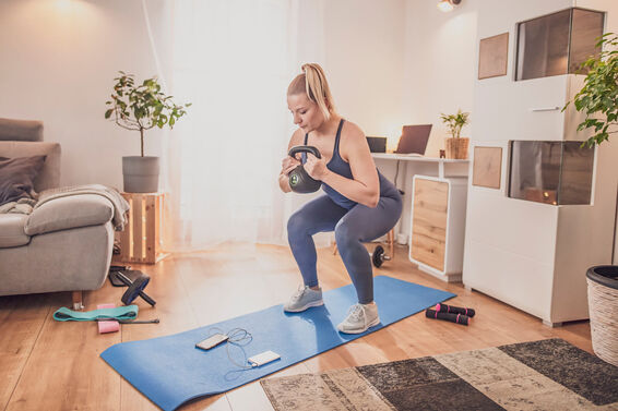 Woman Exercising At Home