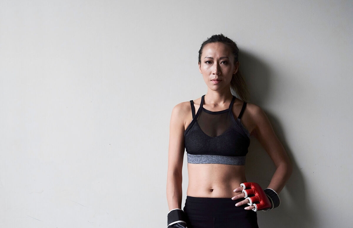 Portrait of confident female boxer