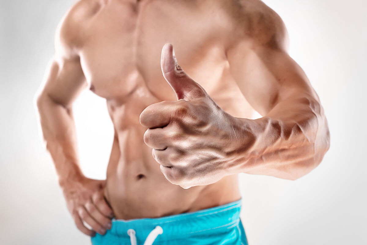 Bodybuilder showing thumbs up