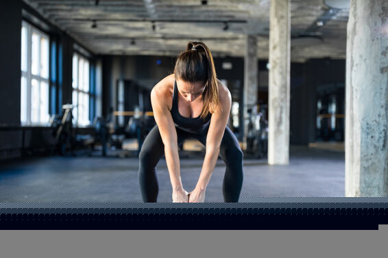 Woman lifting a kettlebell