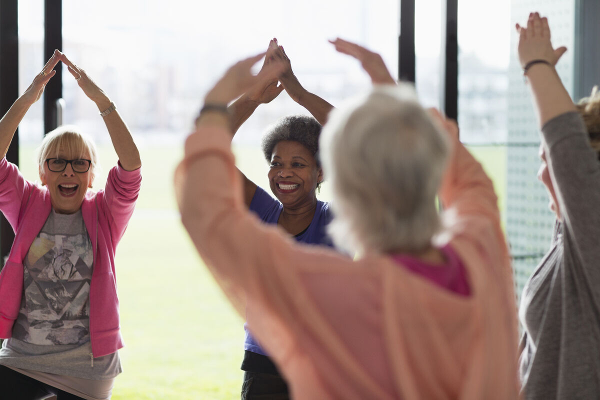 Group of older women stretching