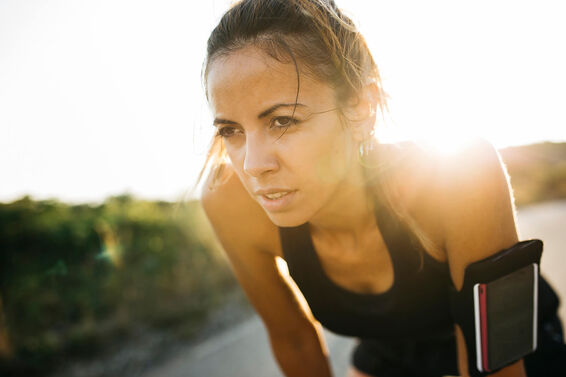 Woman having a break during workout