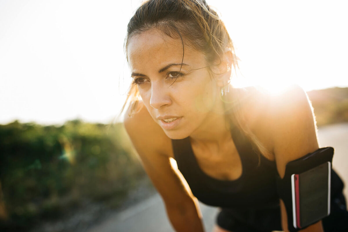 Woman having a break during workout