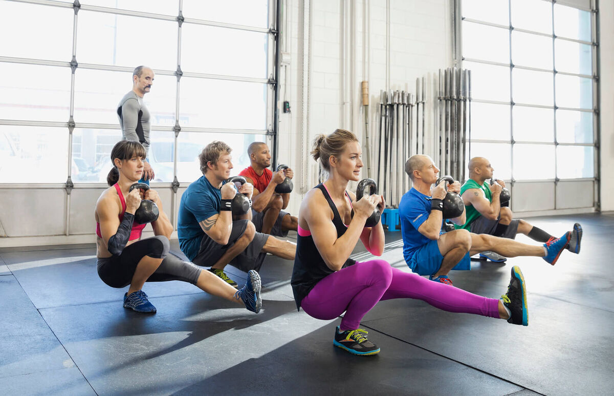 People practicing pistol squats
