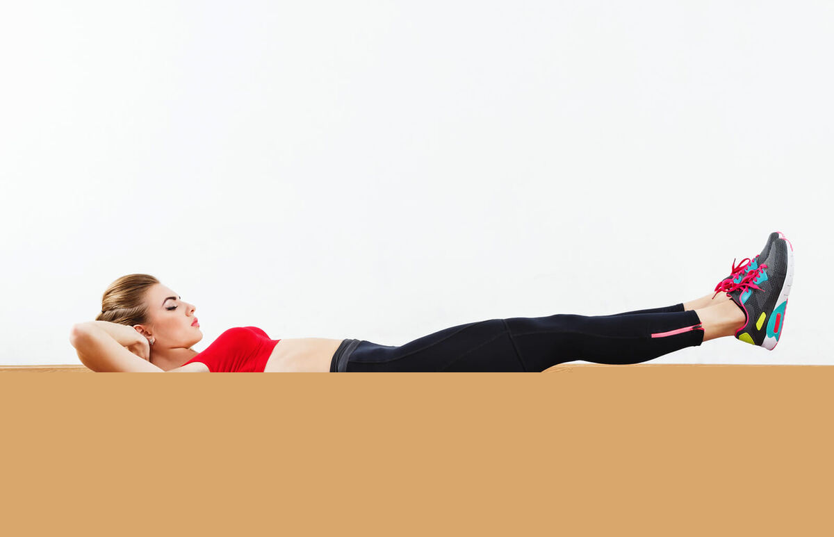 Fit girl doing physical exercises