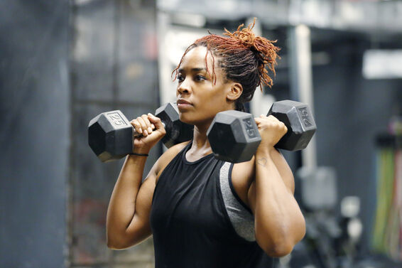 Woman working out with hand weights