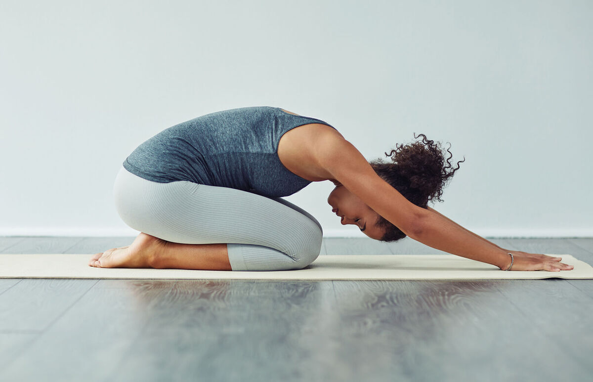 woman practicing yoga