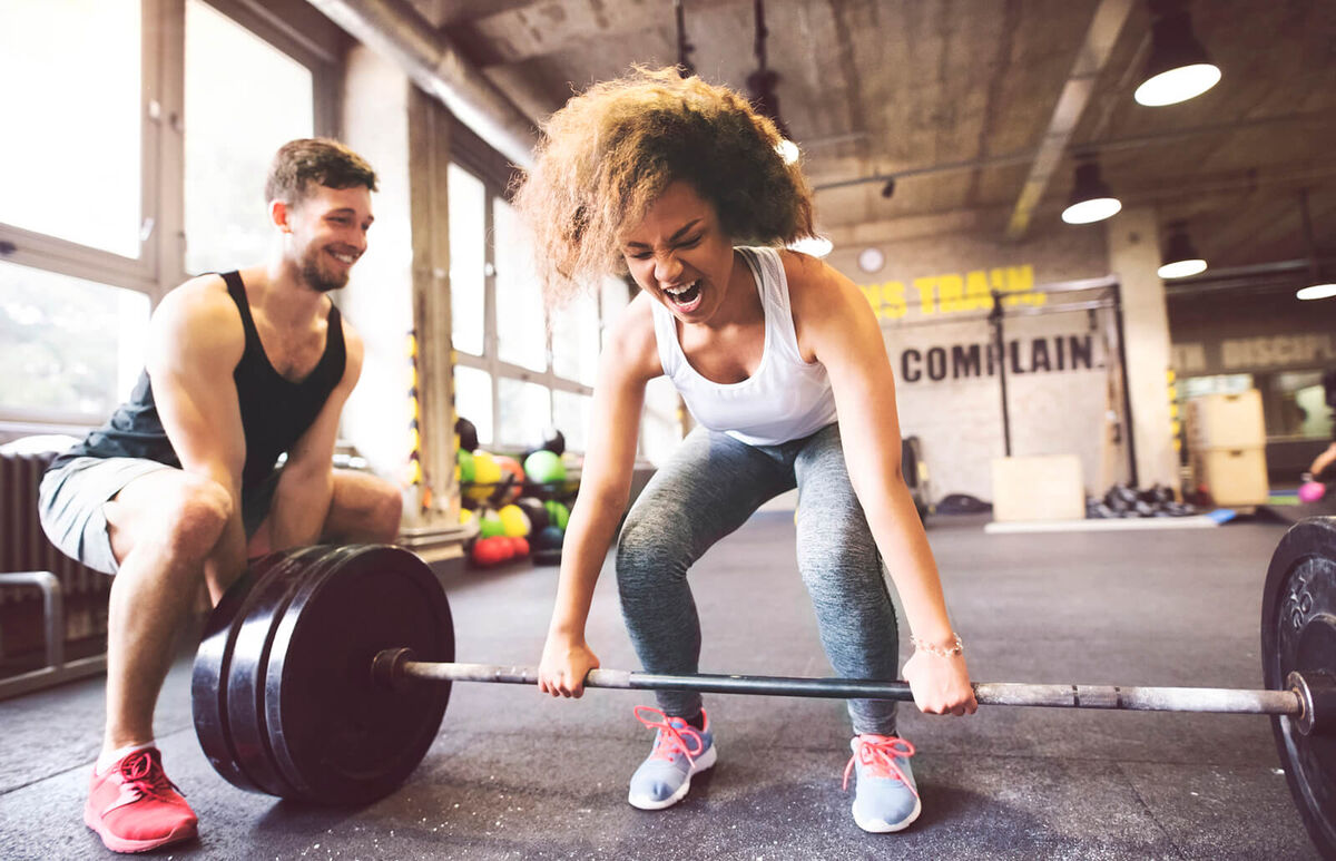 High intensity weight lifting in gym