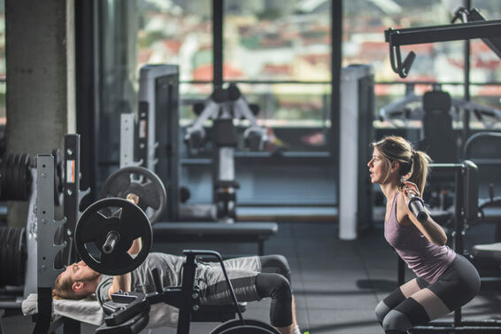 couple having body building training