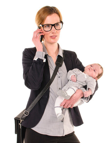 Business woman holding baby