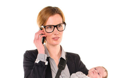 Business woman holding baby