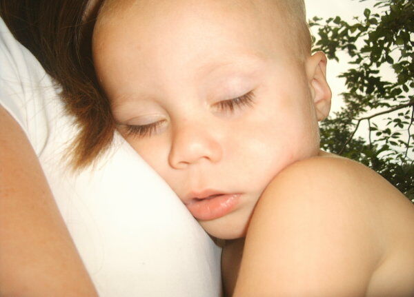 Image of a mother and her adopted baby