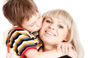 Image of a mom holding a little boy