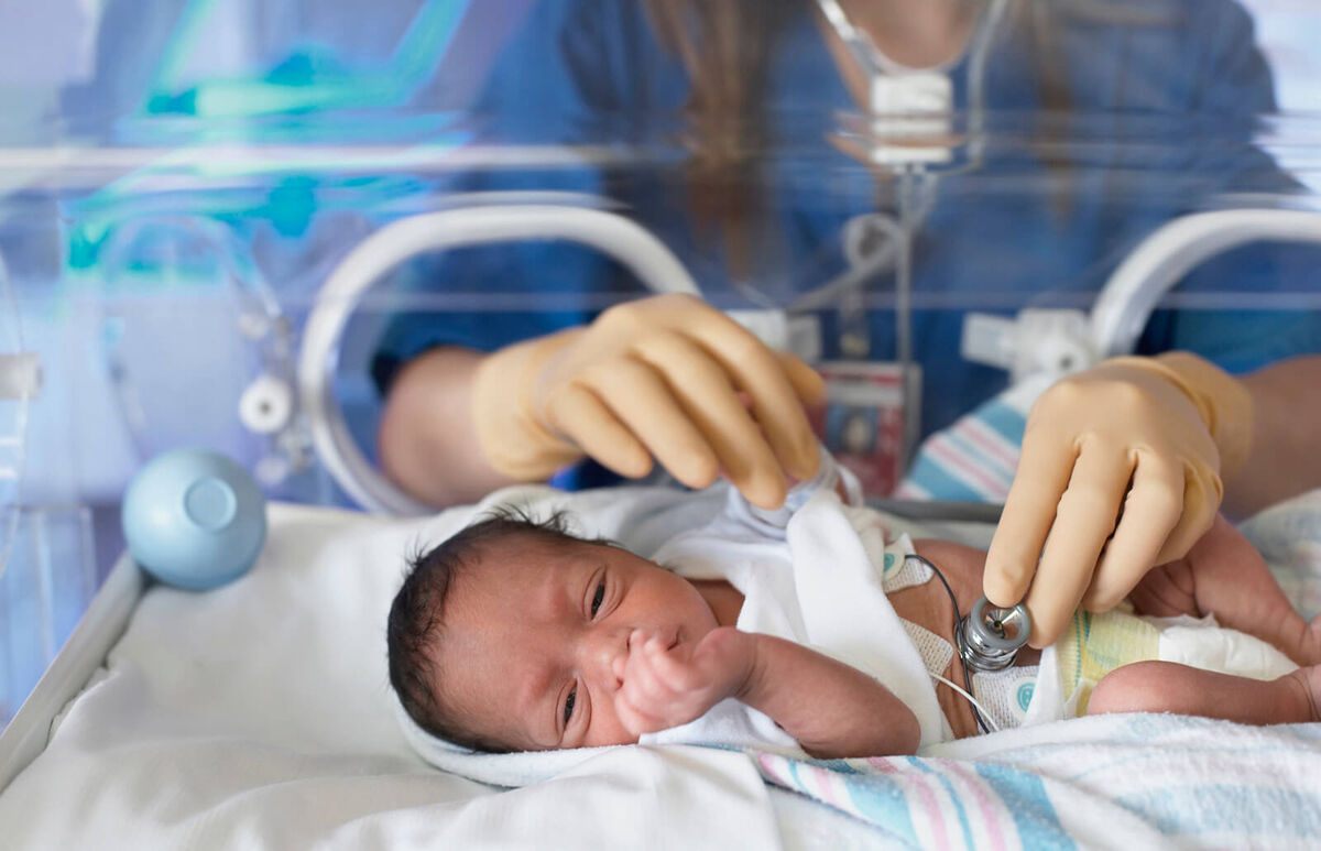 Nurse with preemie