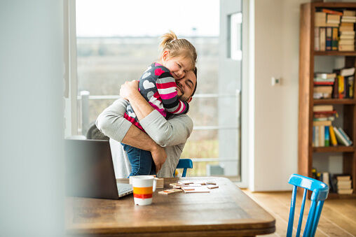 Father and daughter hugging