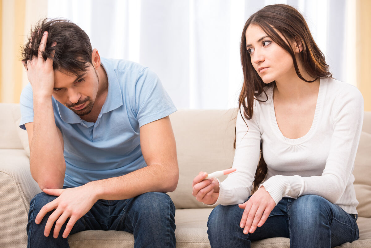 Frustrated couple experiencing conception problems