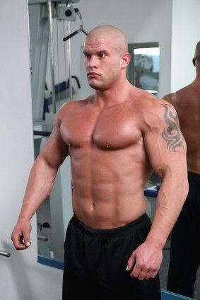 Muscular bodybuilder pondering fertility