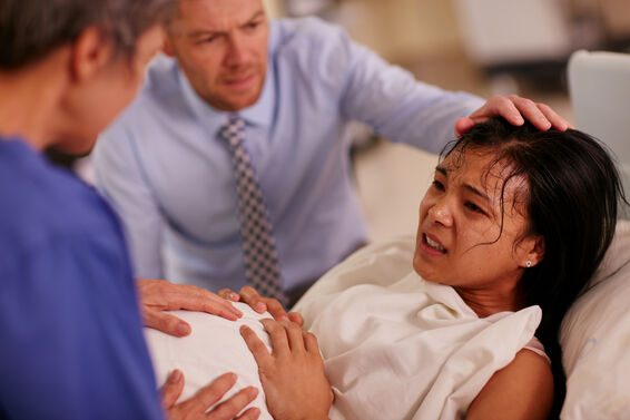 Woman having intense contractions