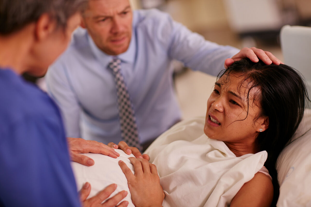 Woman having intense contractions