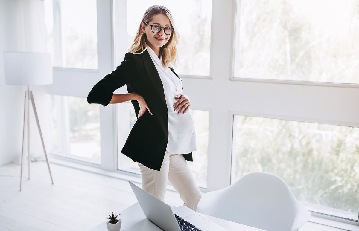 Pregnant woman working