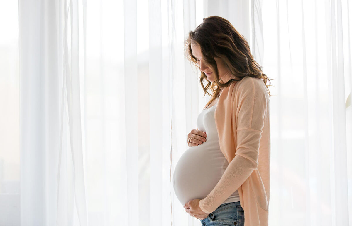 young pregnant attractive woman