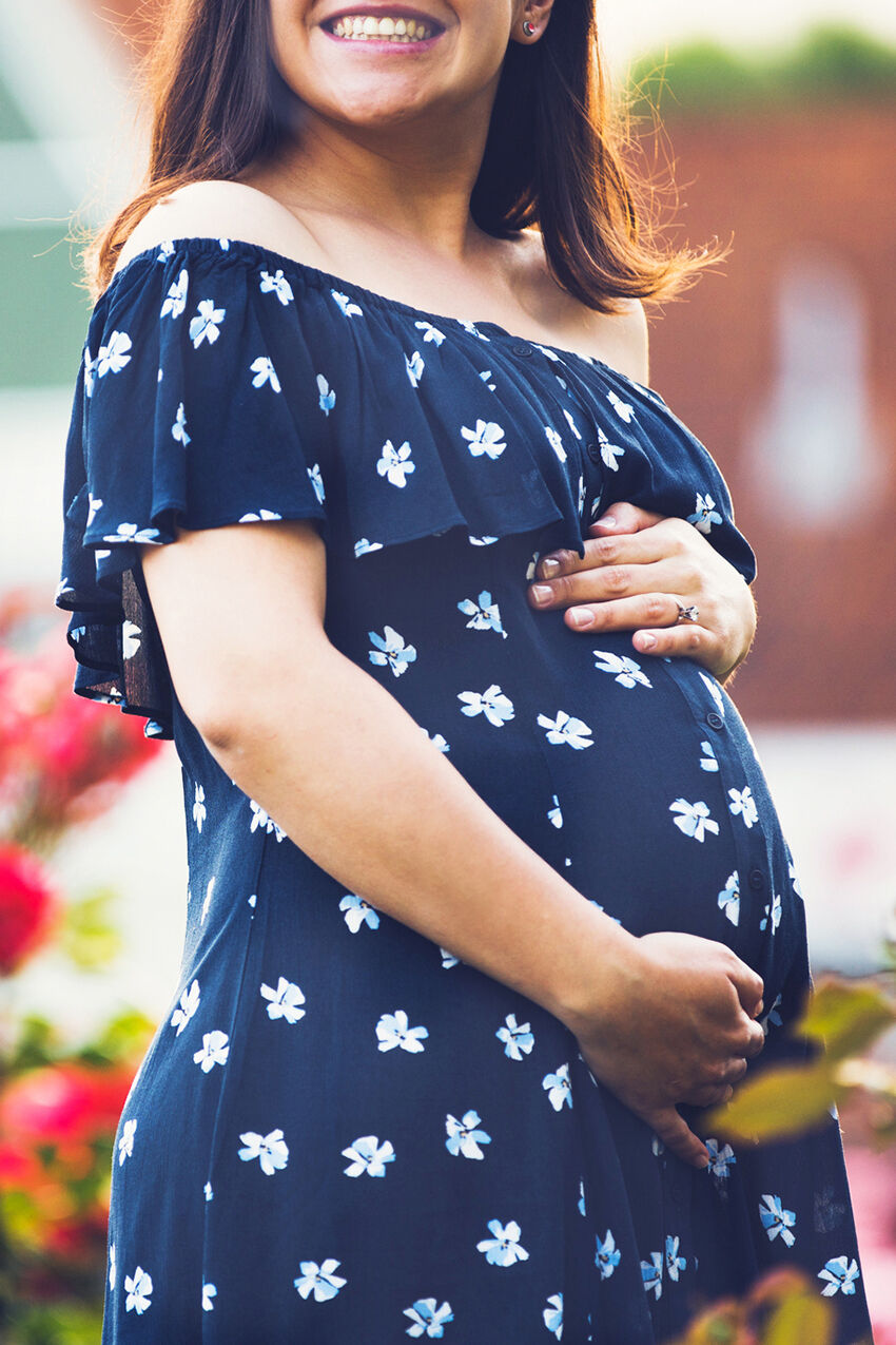 Woman in maternity dress
