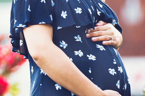 Woman in maternity dress