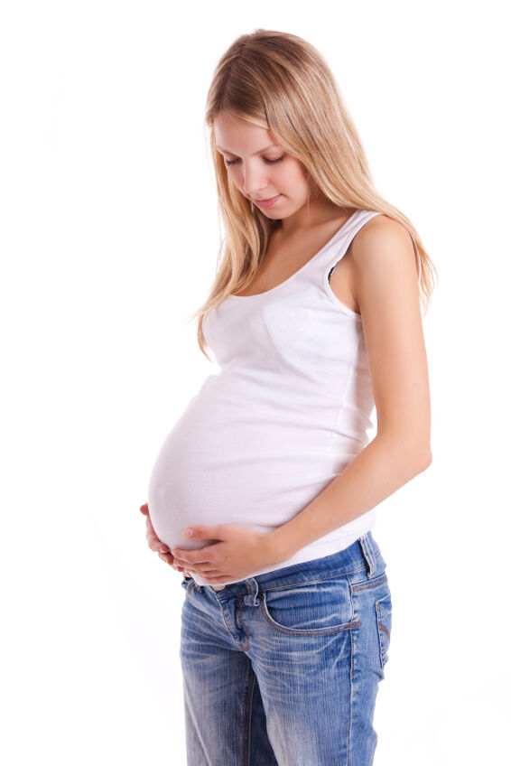 Mom-to-be wearing a white tank top