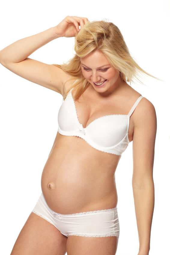 Pregnant woman wearing a new bra